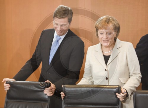 WESTERWELLE , MERKEL