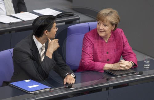 Angela Merkel, CDU, German Federal Chancellor and CDU chairwoman and Philip ROESLER, FDP, German Economics Minister and Vice Chancellor, on the government benches in the Bundestag. Berlin, 09.06.2011