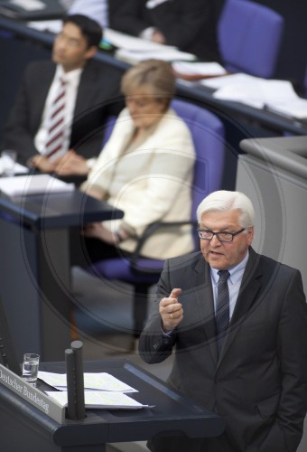 From the left to the right side: Philipp ROESLER, FDP, German Economics Minister and Vice Chancellor, Angela MERKEL, German Federal Chancellor and CDU chairwoman and Frank-Walter STEINMEIER, SPD party leader, in the Bundestag. Berlin, 10.06.2011.