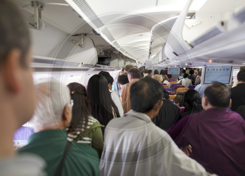 Passagiere in einem Flugzeug