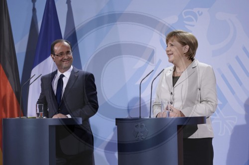 Merkel, Hollande