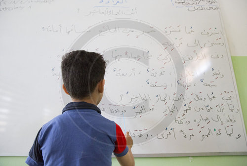 Irakischer Junge in der Al Huda Schule von UNICEF, eine mit BMZ Mitteln rehabilitierte Schule in WestMosul,