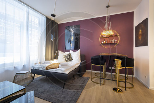 Schlafzimmer, Ausziehsofa  in einem Luxus Apartment in Berlin