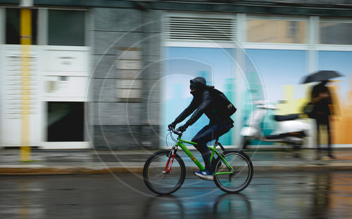 Fahrradfahrer im Regen