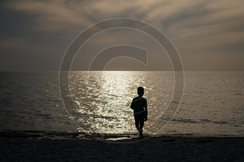 Kind am Strand