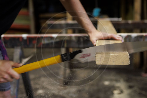 Arbeiten mit Handsaege